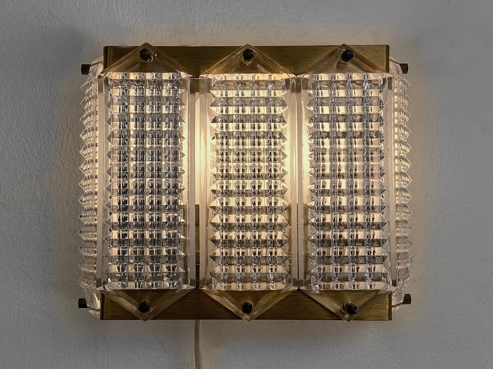 Brass and glass wall light/sconce by Wiktor Berndt for Flygsfors. Sweden 1960s