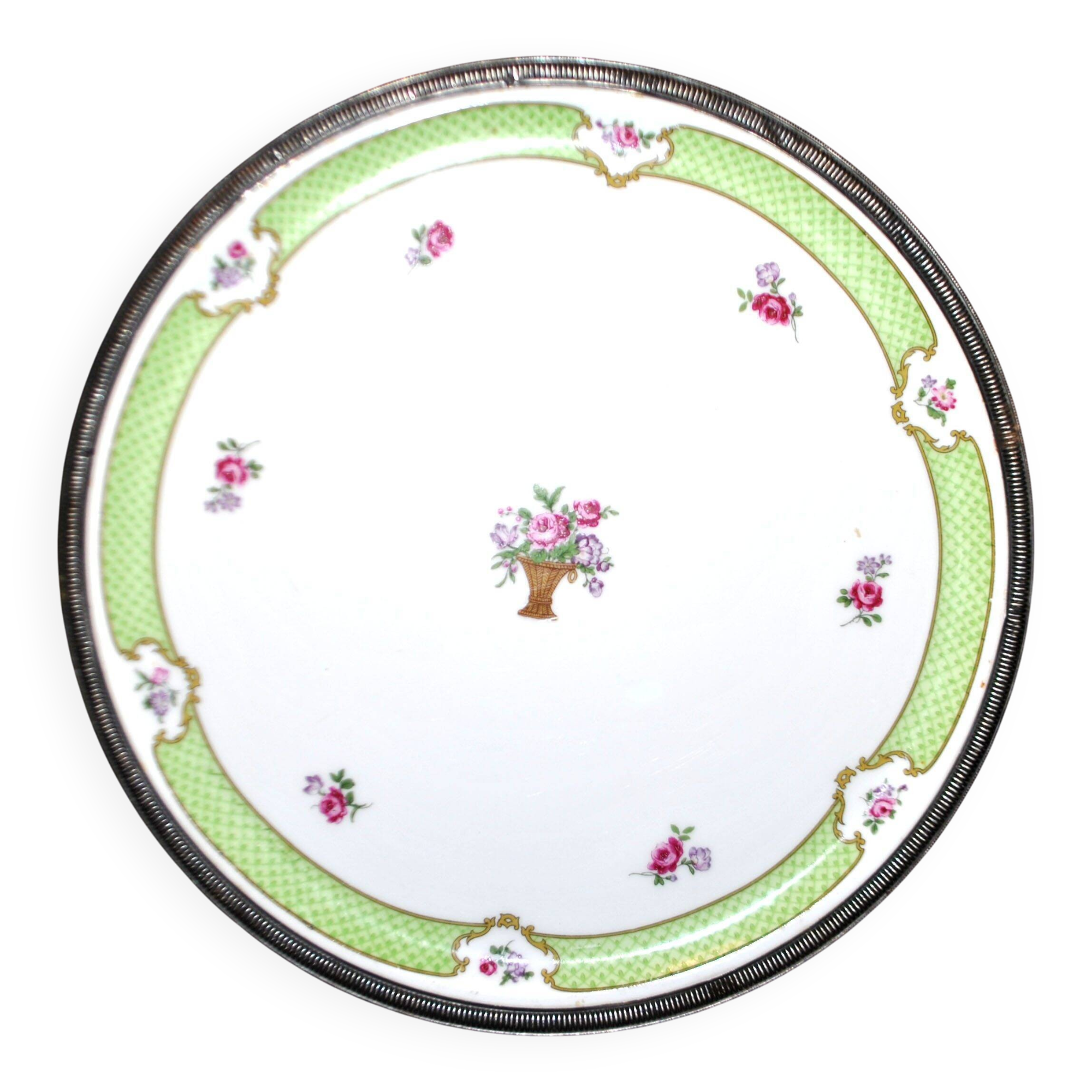 Haviland pie dish in Limoges porcelain with a Minerva silver rim.