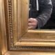 Large antique Napoleon III mirror – Wooden and gilded stucco frame – 135 × 114