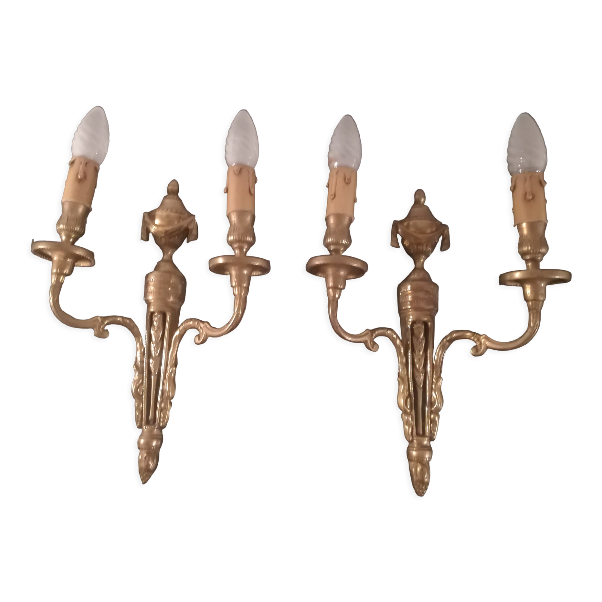 Pair of Louis XVI style sconces in gilded bronze