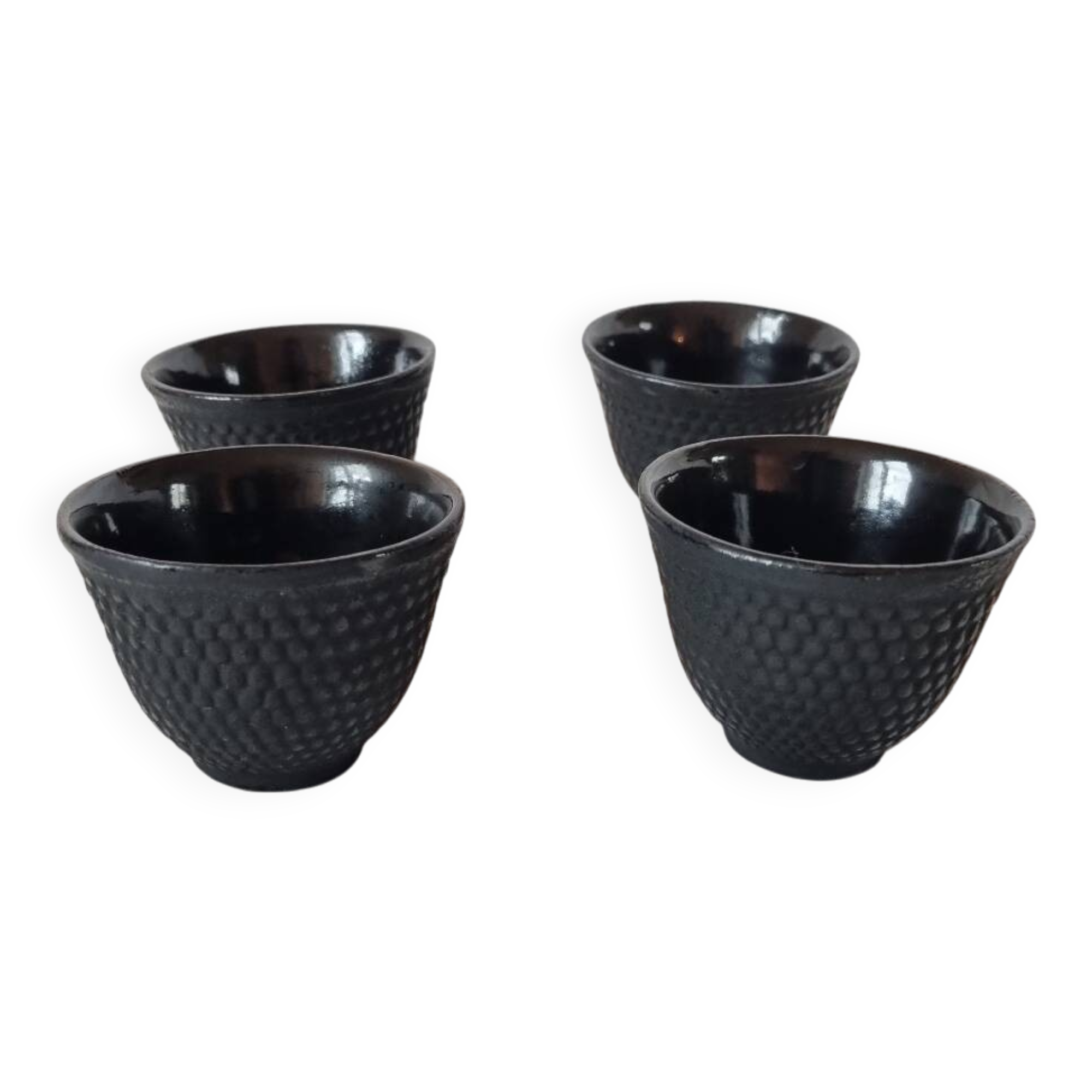 4 black cast iron teacups