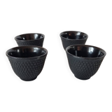 4 black cast iron teacups