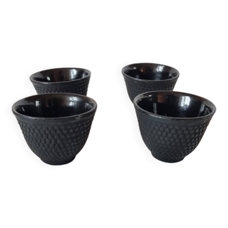 4 black cast iron teacups