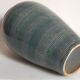 Oblong ceramic vase sacrificed with blue enamel
