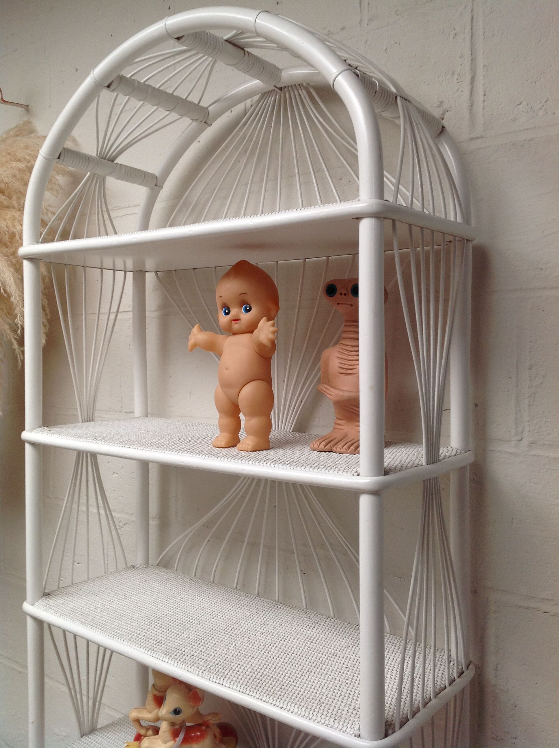 White lacquered rattan bookcase