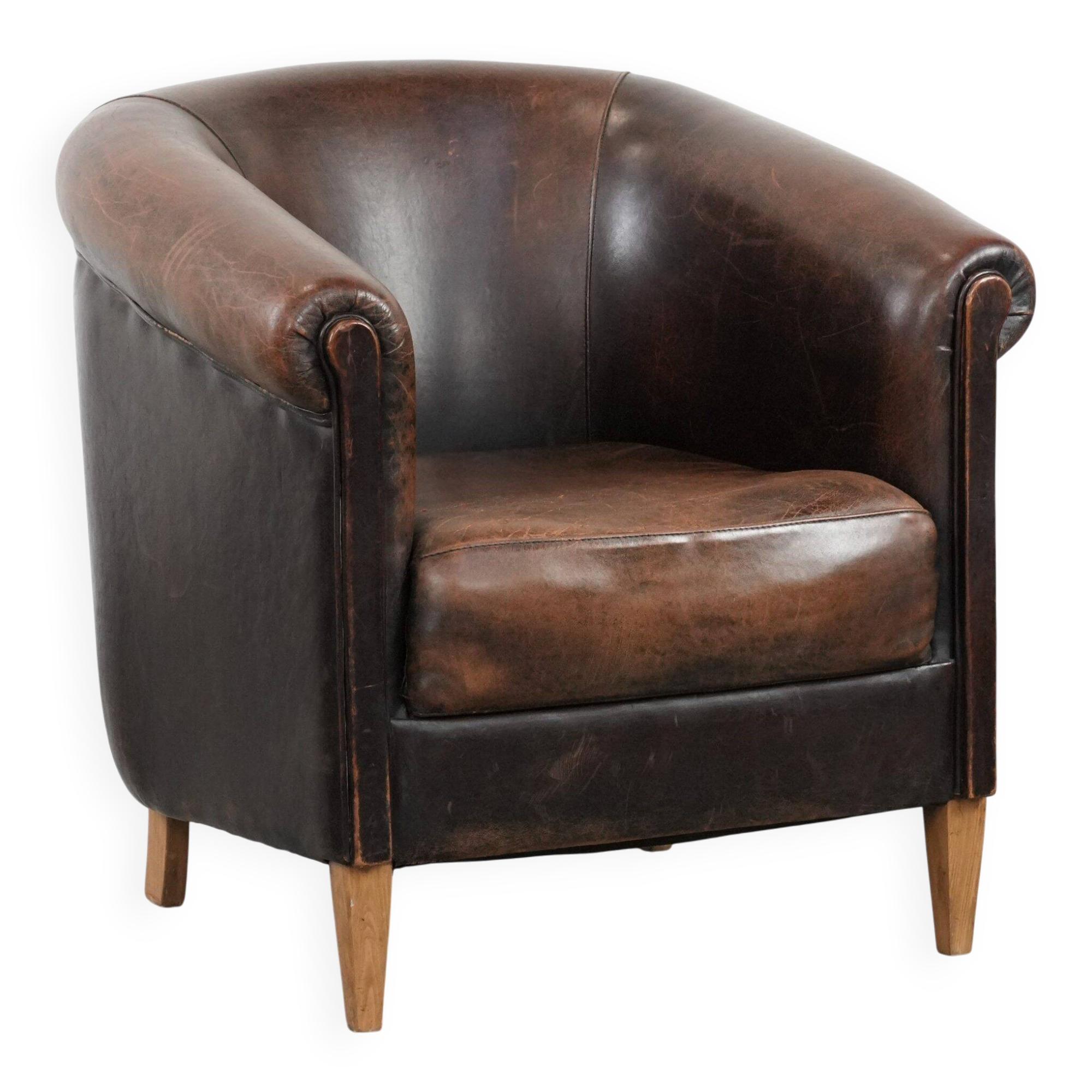 Characterful club armchair made of sheepskin with a beautiful patina