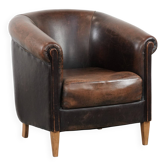Characterful club armchair made of sheepskin with a beautiful patina