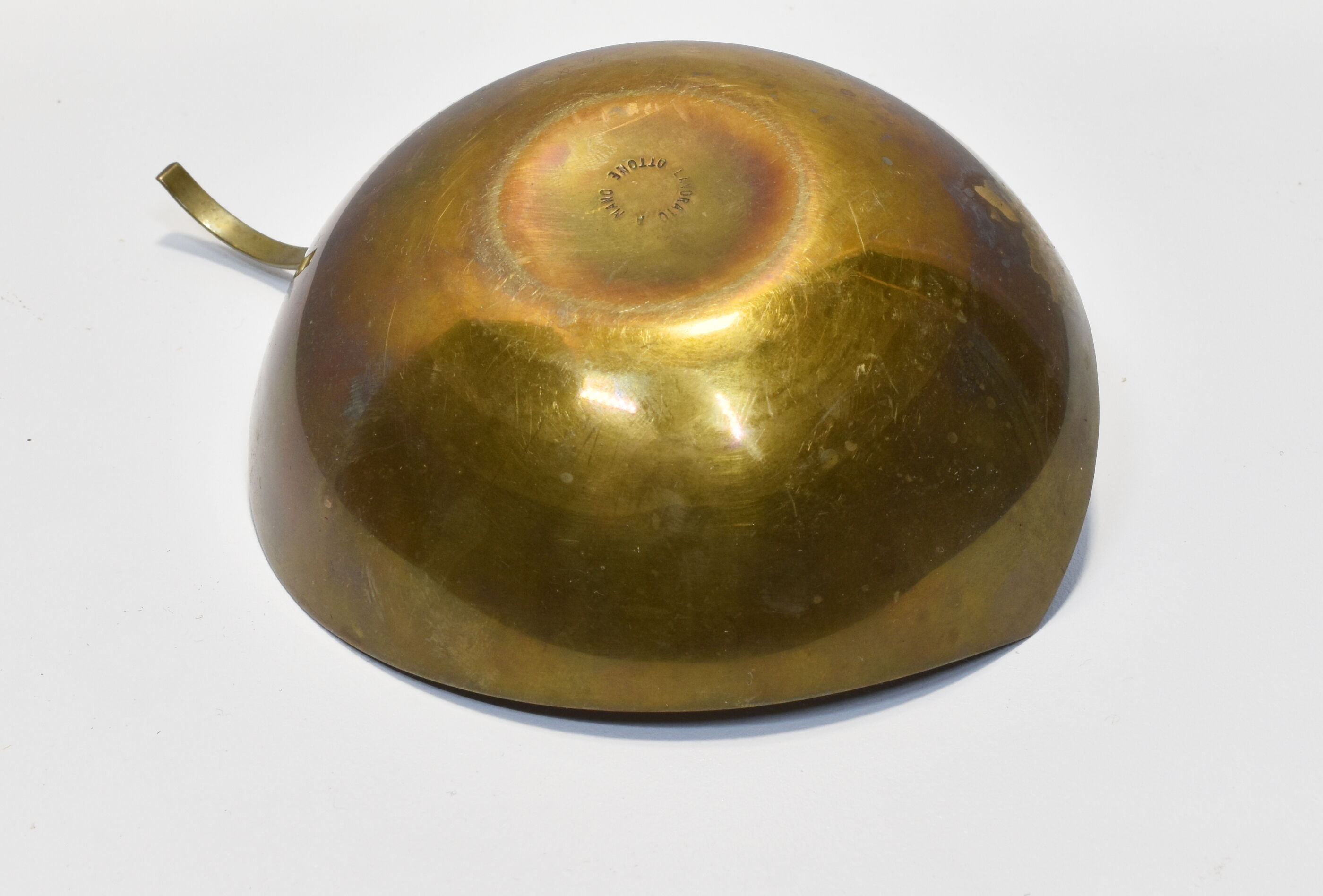 Empty brass leaf pocket