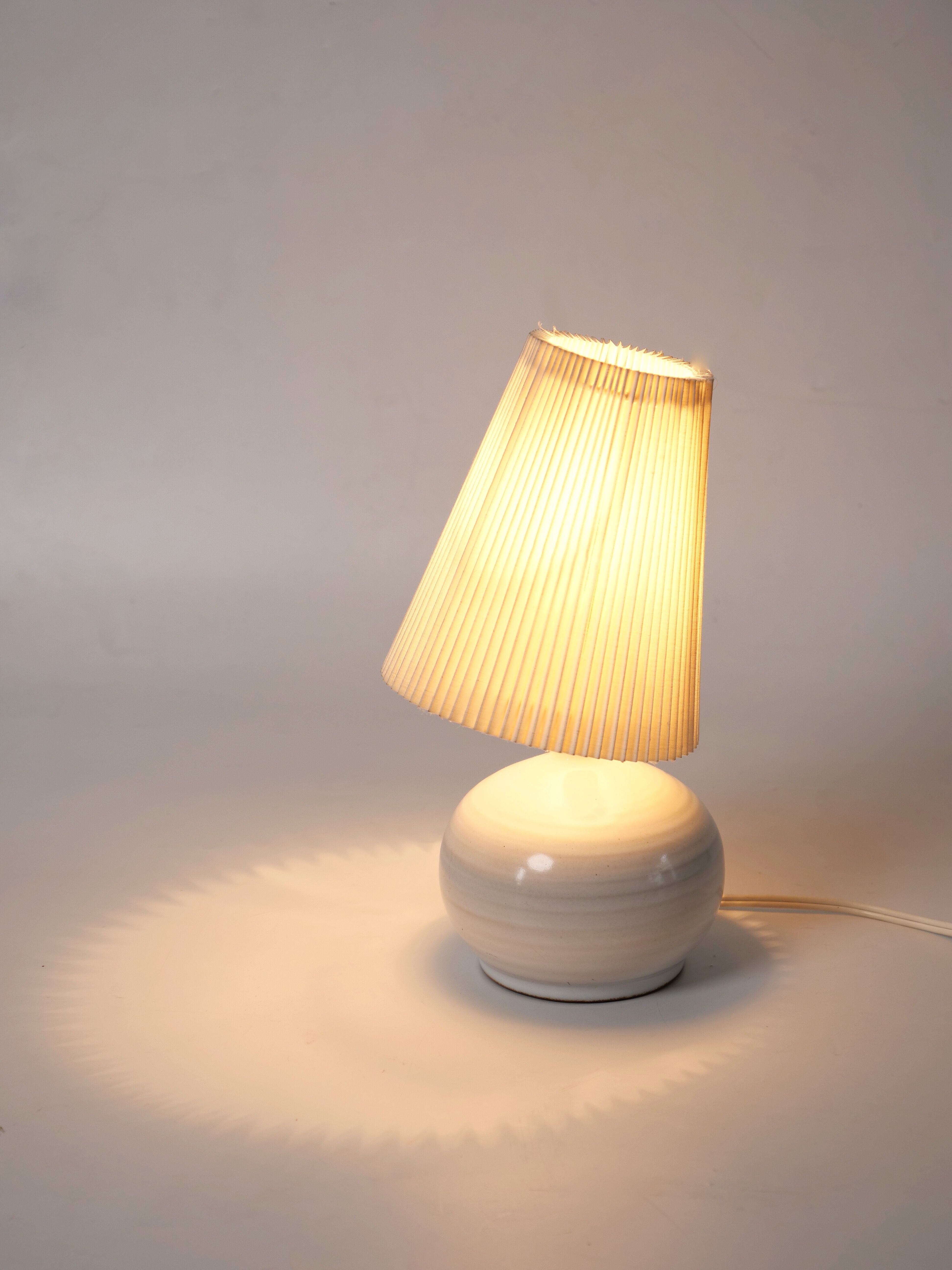 Terracotta lamp signed