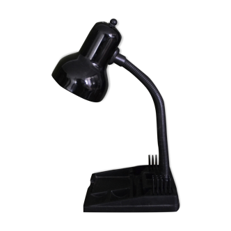 Black flexible desk lamp with built-in flashheld