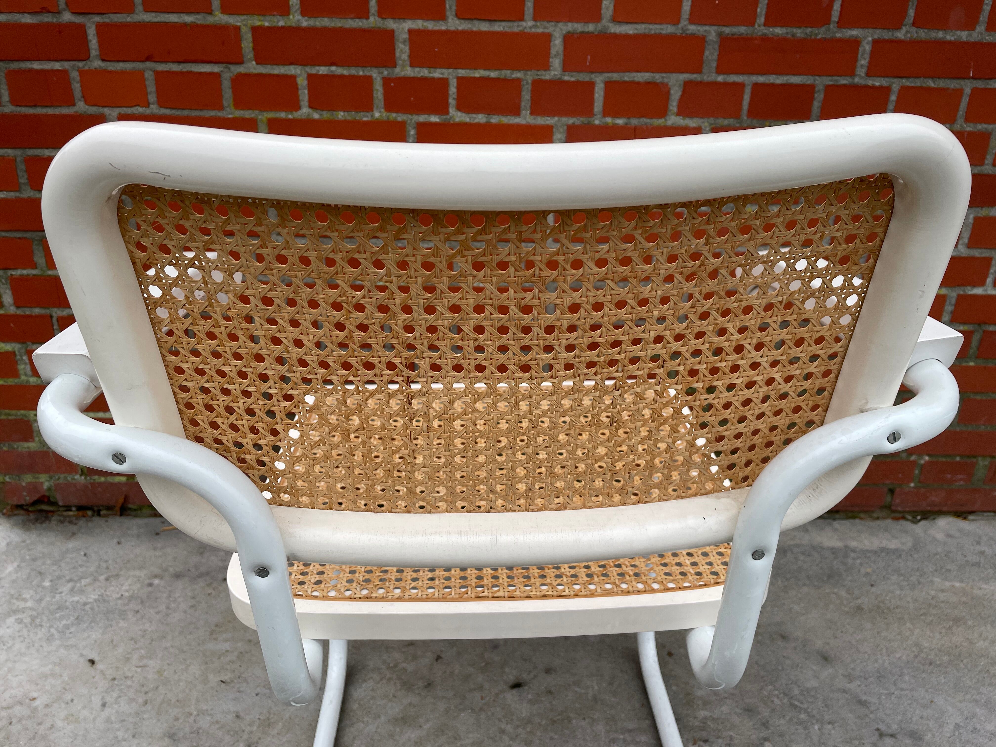 Cesca chair model with armrest in white