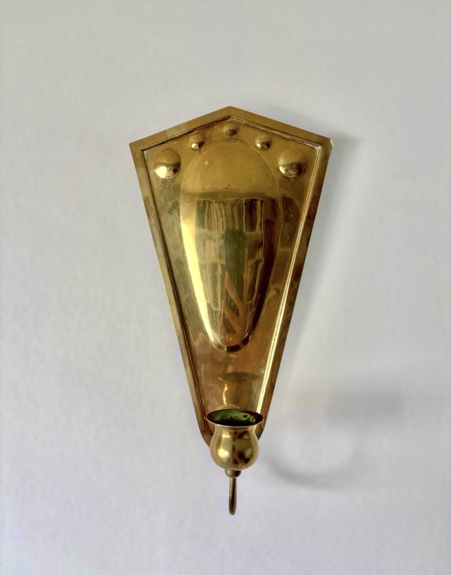 Scandinavian wall candle holders in brass