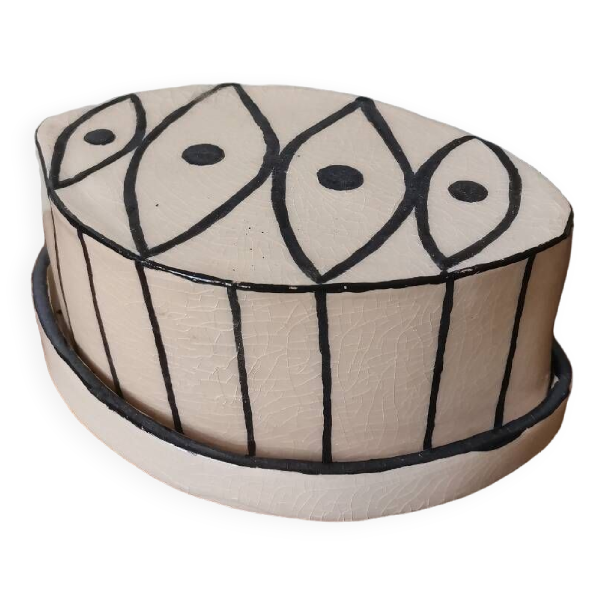 Vintage artisanal rustic ceramic butter dish with geometric eye pattern