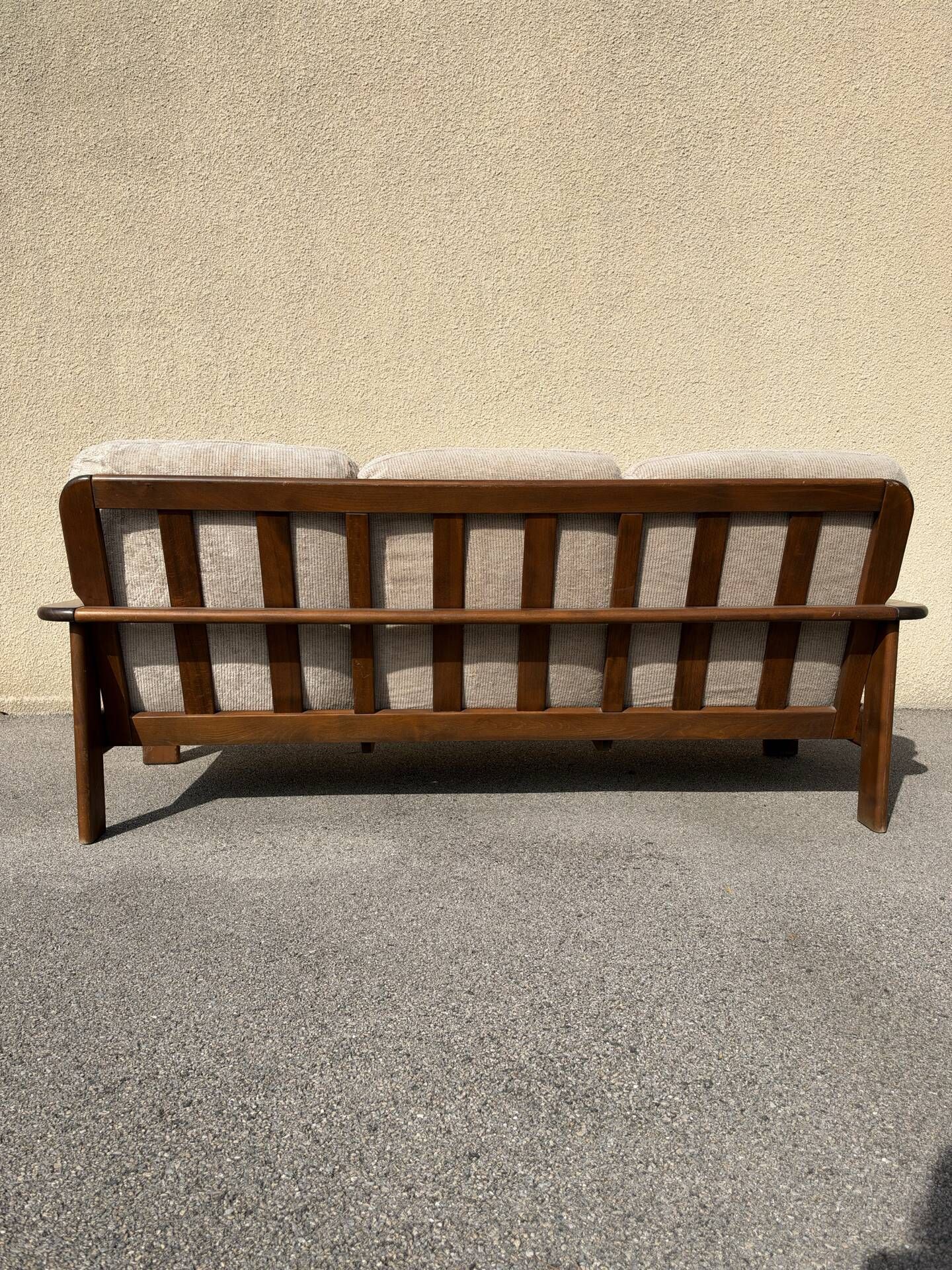 Three-seater sofa in Danish teak from the 1960s.