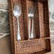 Woven rattan covered storage