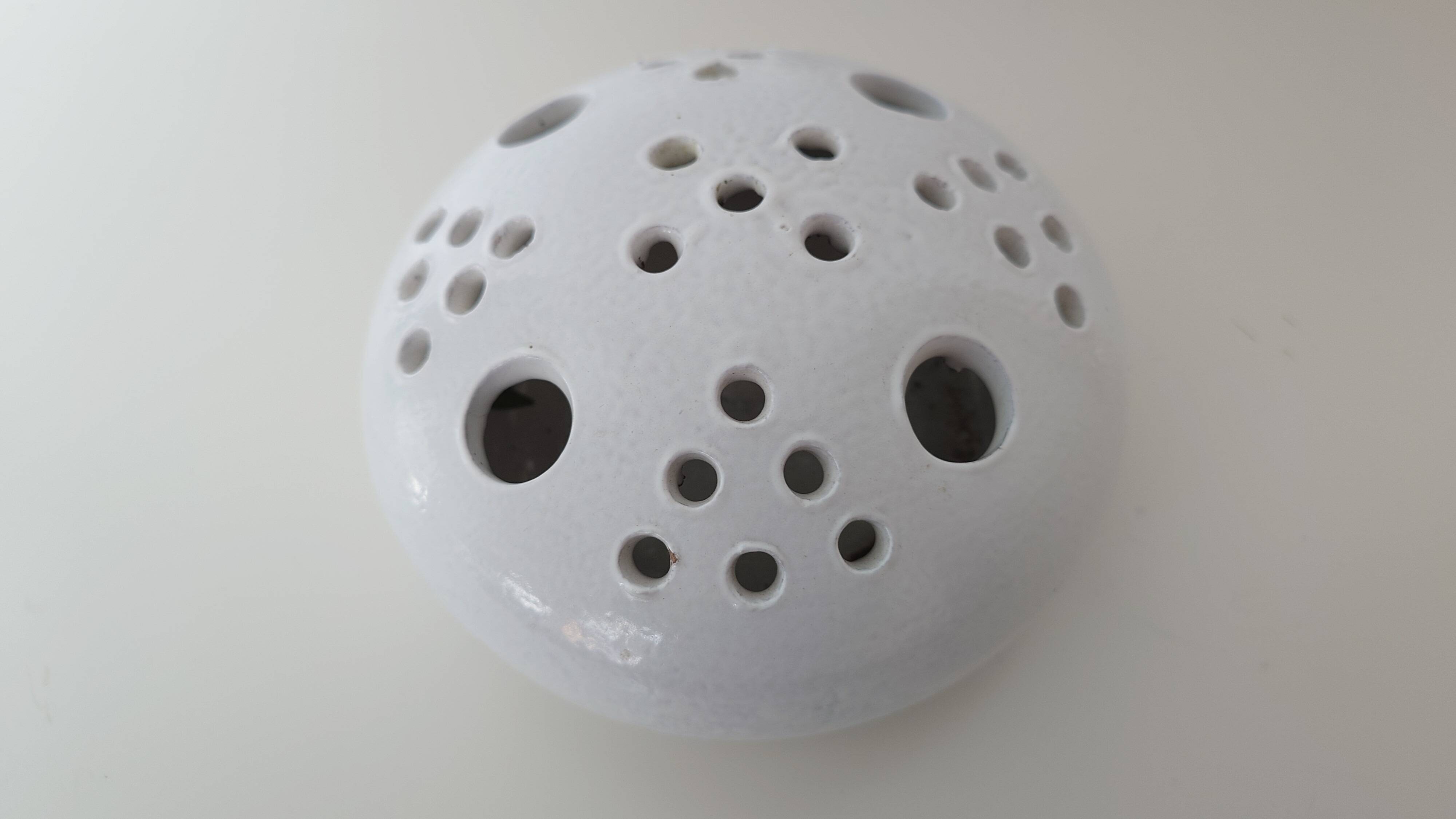 Centrepiece, white ceramic flower holder signed.