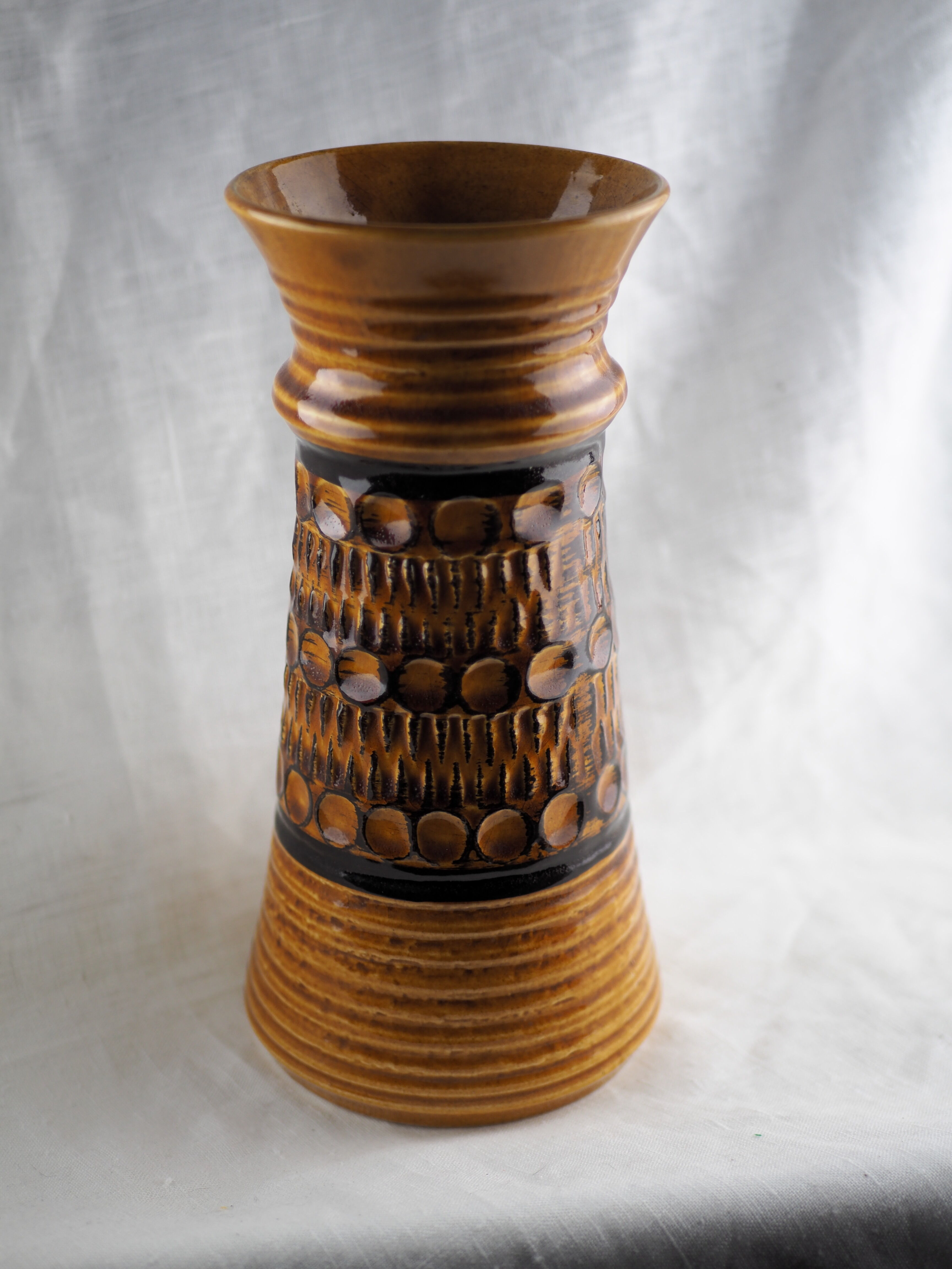 High arched vase, round hollow patterns and spikes, black and ocher seventies vibe - Bay Keramik - 70'