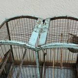 Ancient bird cage in wood and metal