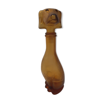 Bouteille en verre ambré représentant un chien Empoli Italie années 60