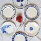 Old mismatched earthenware dinner plates