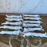 Set of 11 Art Deco zoomorphic knife holders