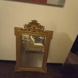 Miroir en bois sculpté fin XIXe