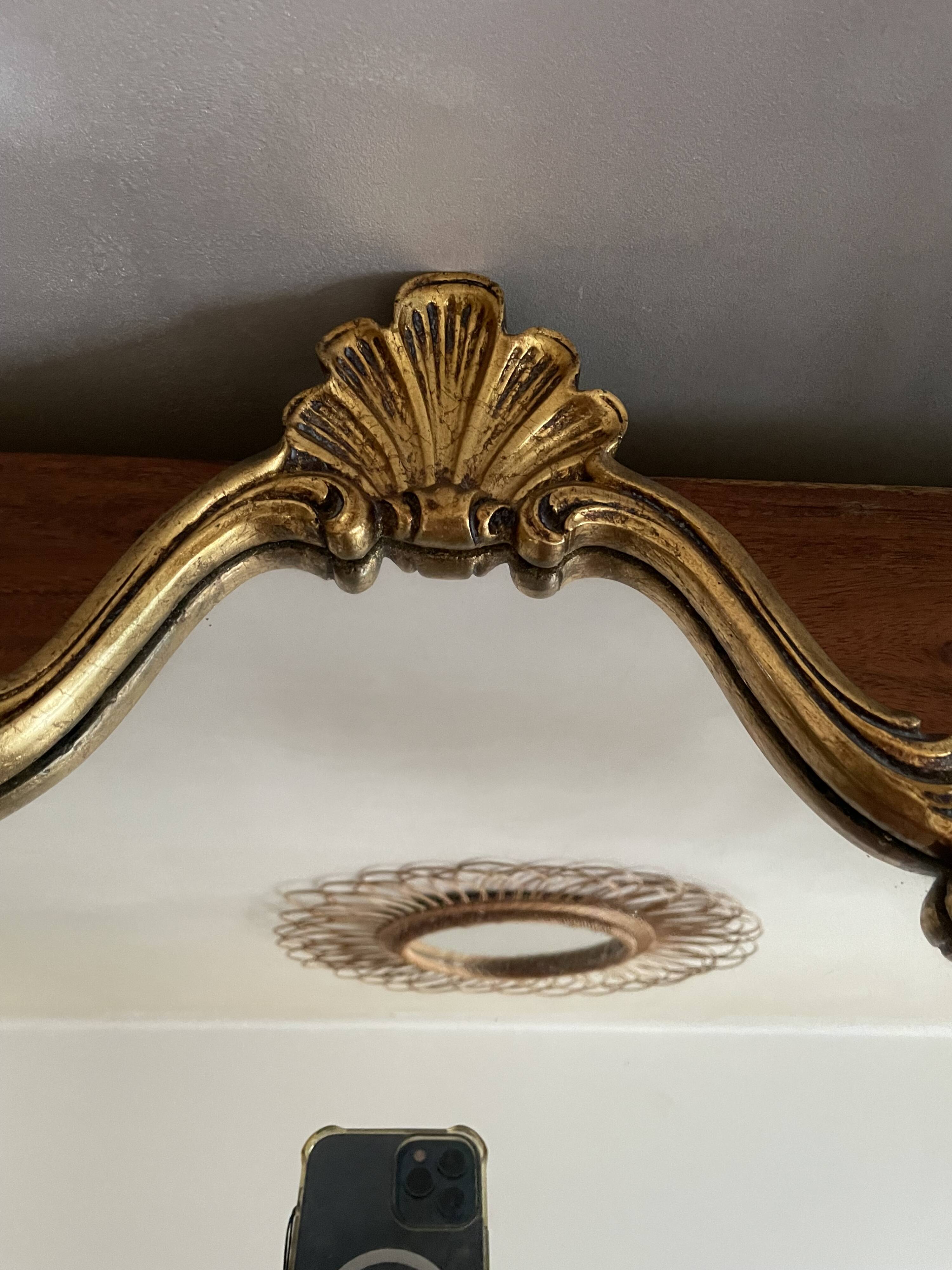 Baroque style mirror in gilded wood