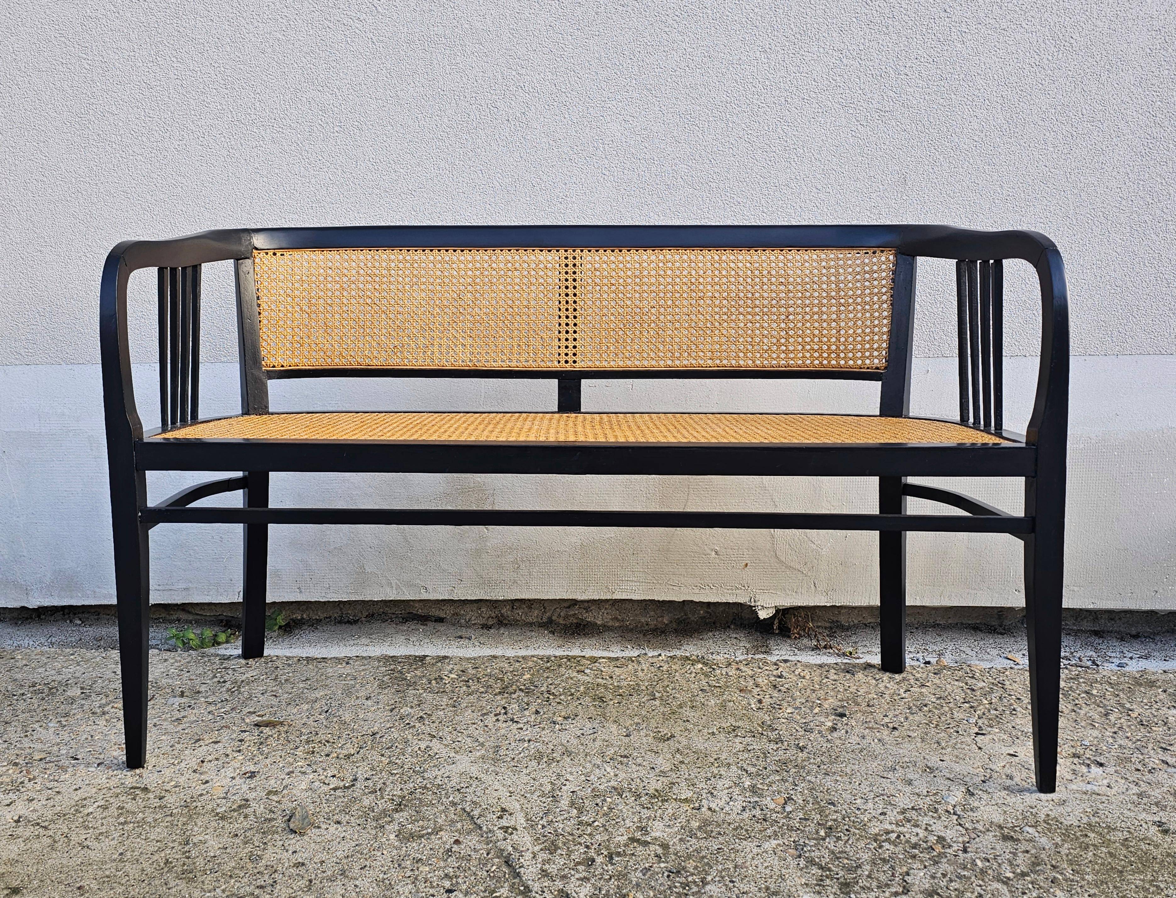 Vienna Secession beech canapé with cane seat and backrest.