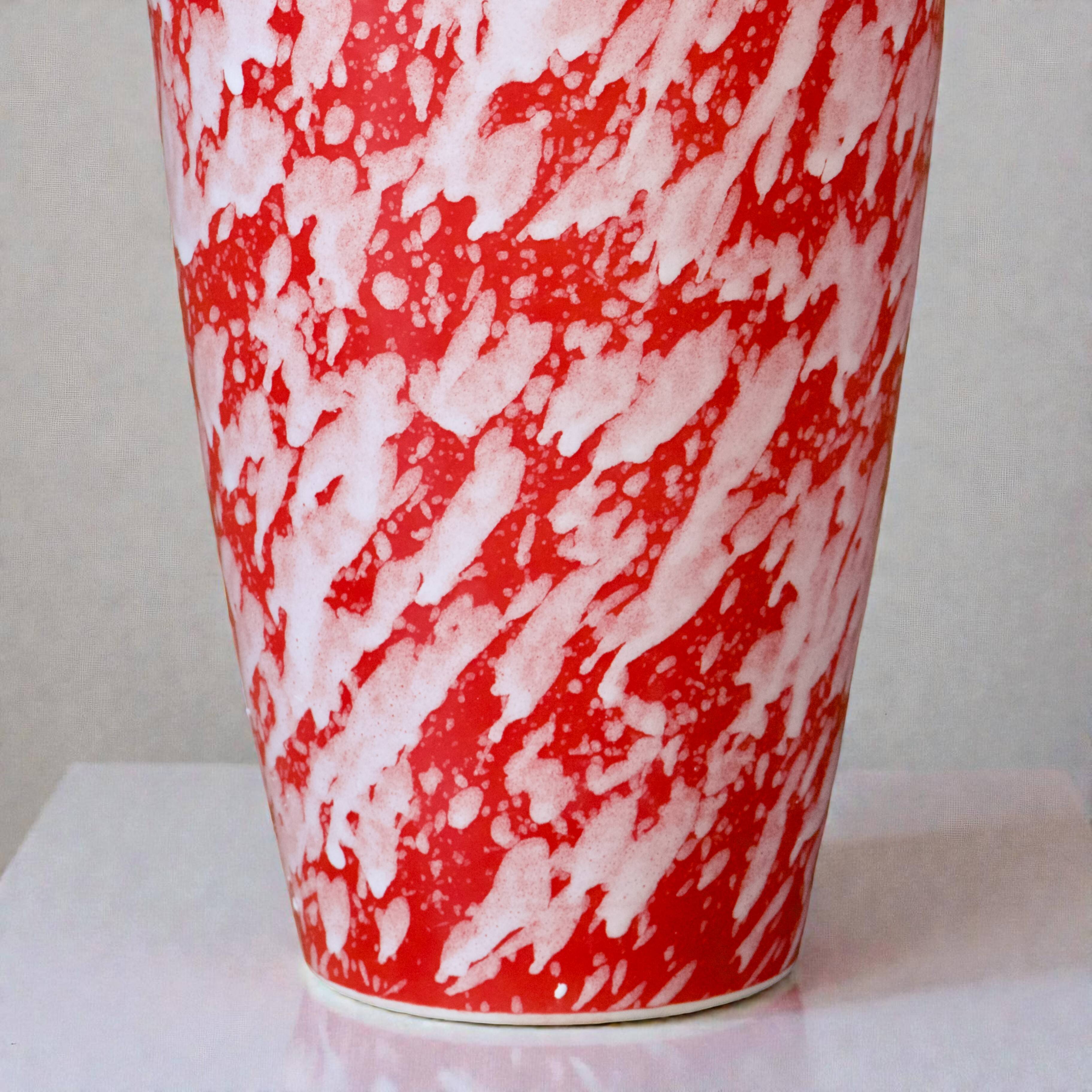 Large handcrafted vase in red speckled glazed ceramic.