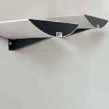 Pair of modernist wall lights, black and white lacquered metal, Italy 1980