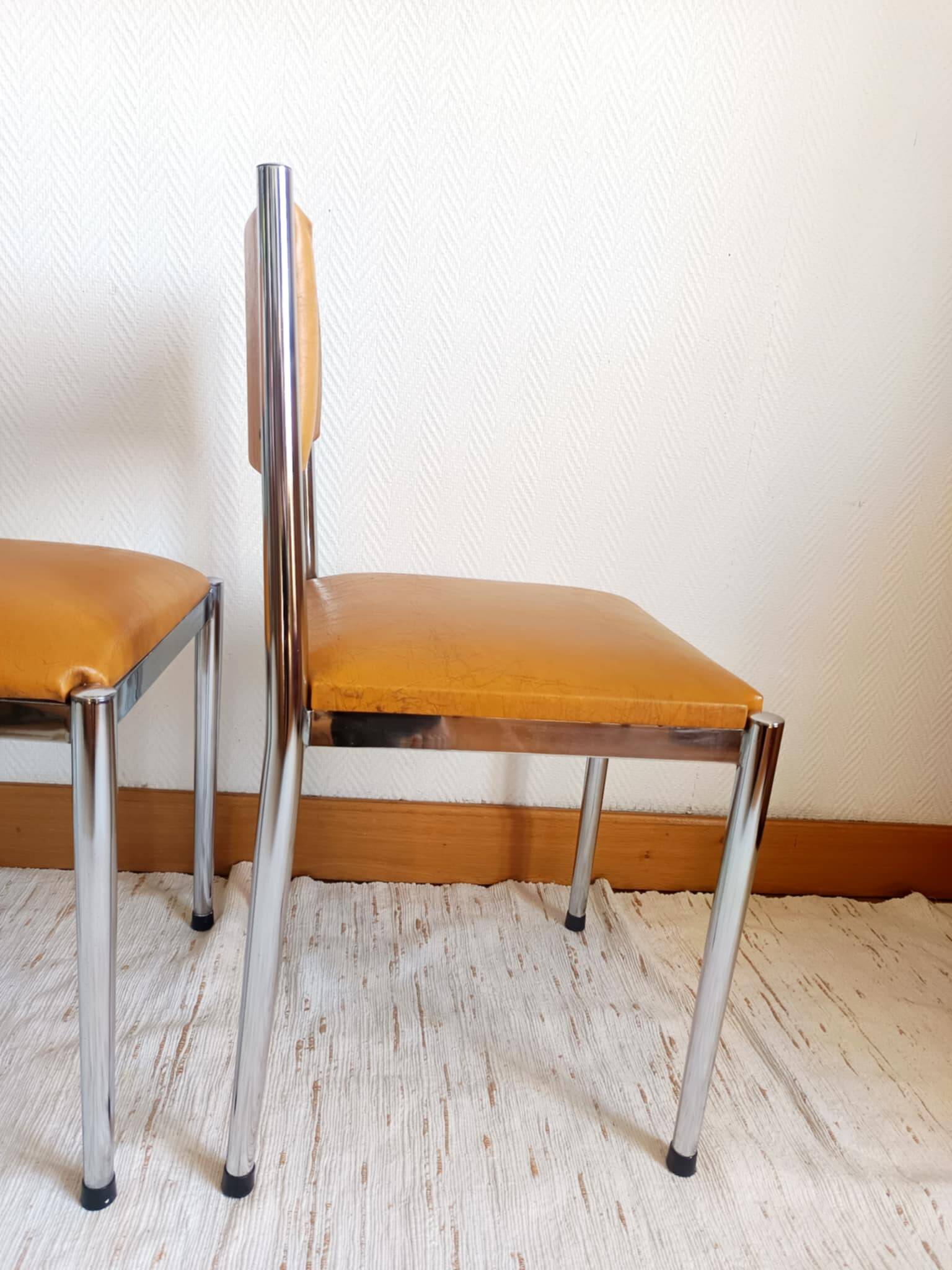 Pair of vintage leatherette and chrome chairs from the 1970s