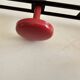 Wall-mounted coat rack in black and red metal (4 hooks)