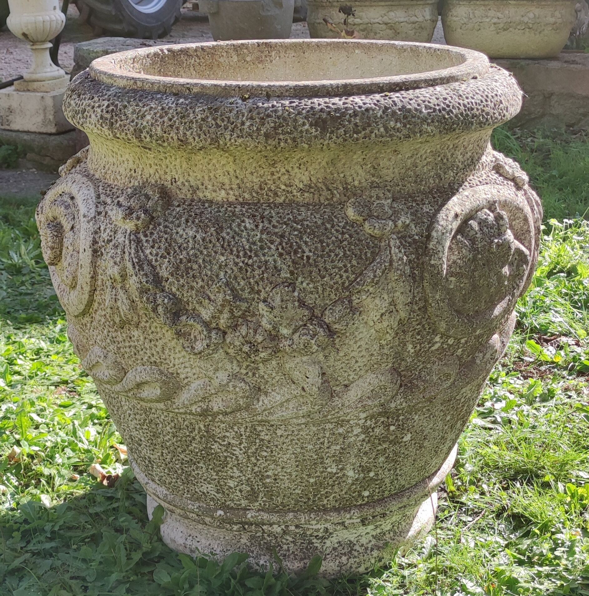 Pair of Medici pot caches in reconstituted stone