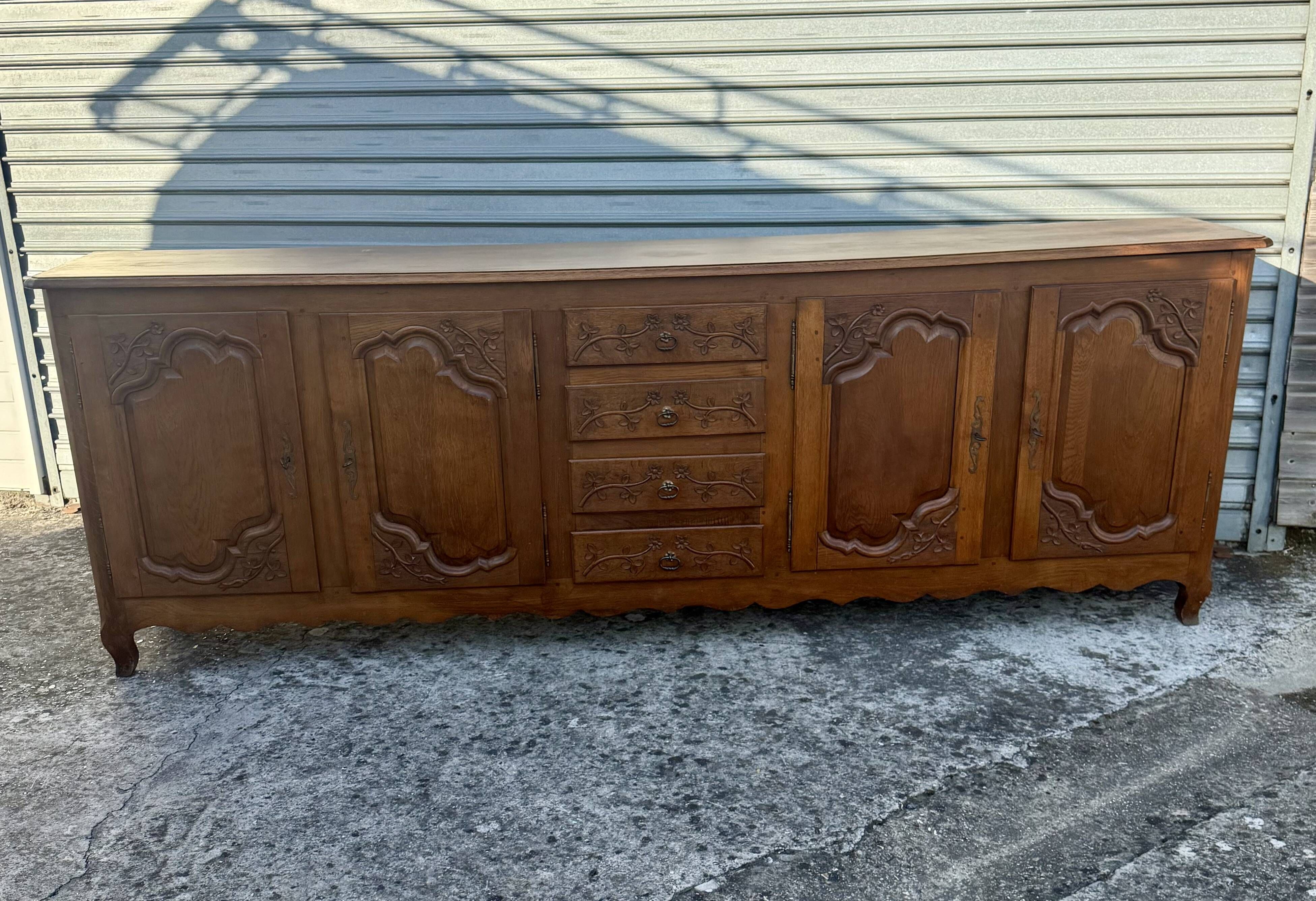 Picard enfilade in Louis XV style made of solid oak.