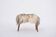 Danish Mid-century Modern stool reupholstered in white and black sheep skin