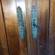 A walnut wardrobe with marquetry and boxwood stringing, dating from the Consulate period, circa 1810.
