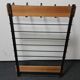 Coatrack mural vintage en teck et métal