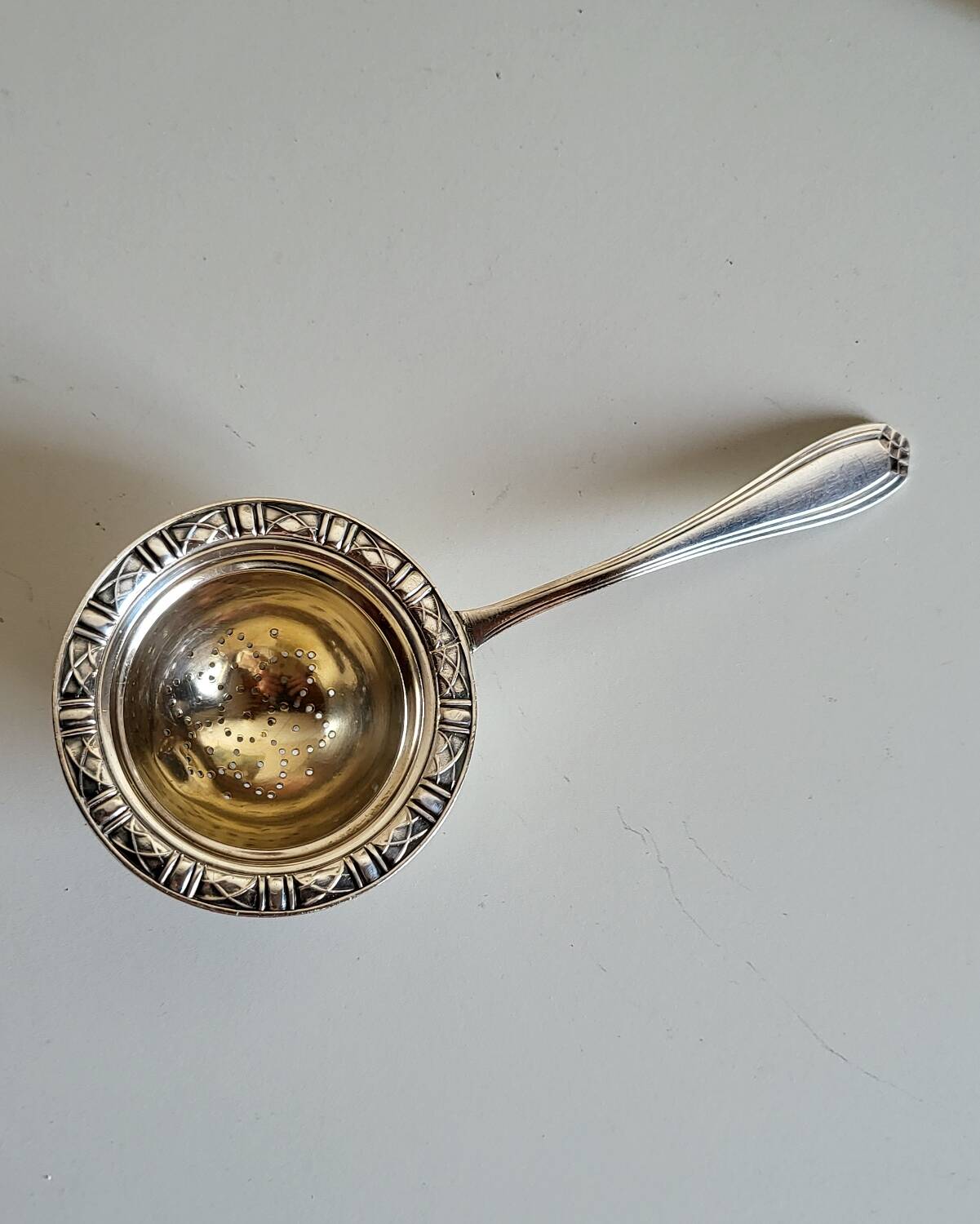 Silver-plated tea strainer