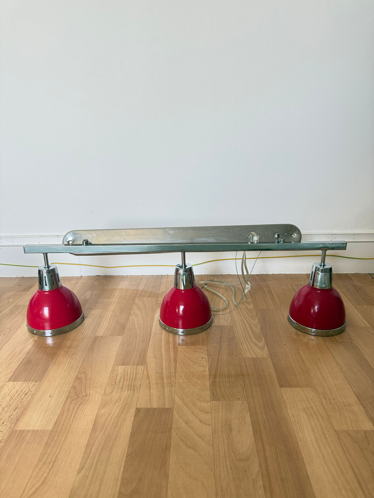 Designer pendant light with 3 red and chrome spots