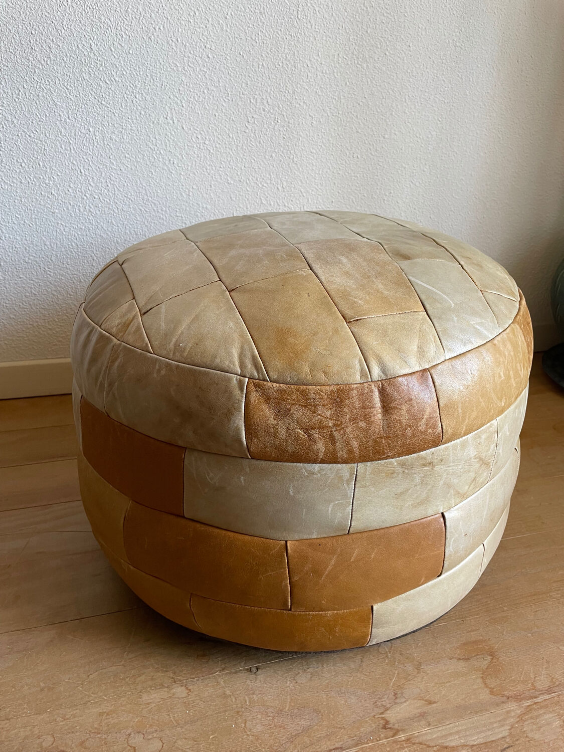 Brown and beige patchwork leather pouf from sede