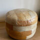 Brown and beige patchwork leather pouf from sede