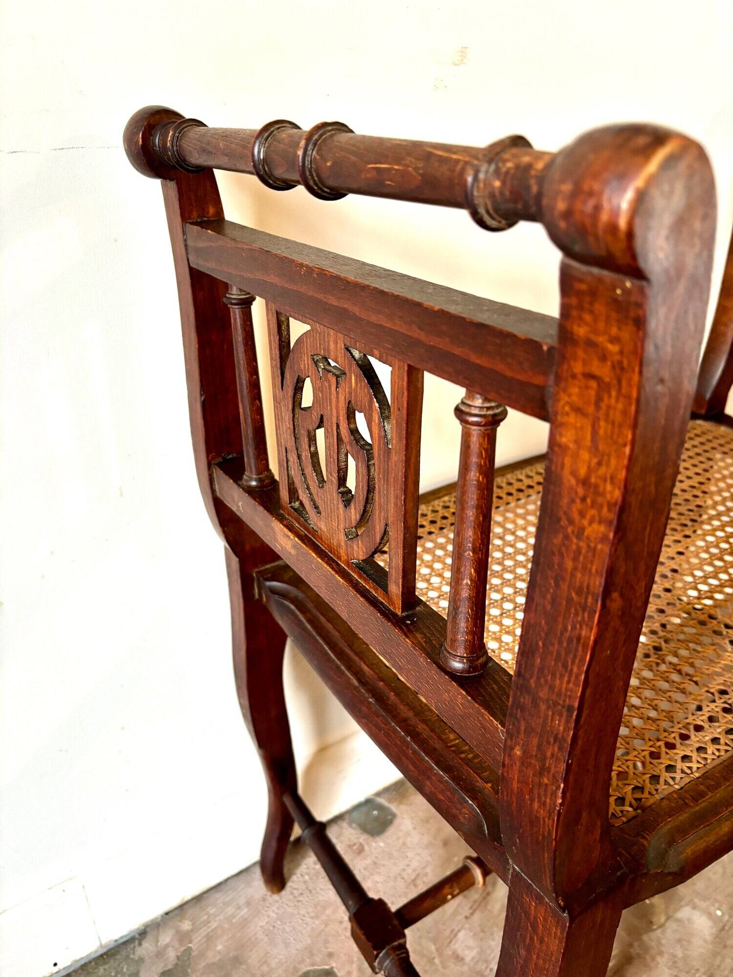 Dark wood and cane bench