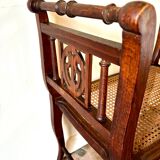 Dark wood and cane bench