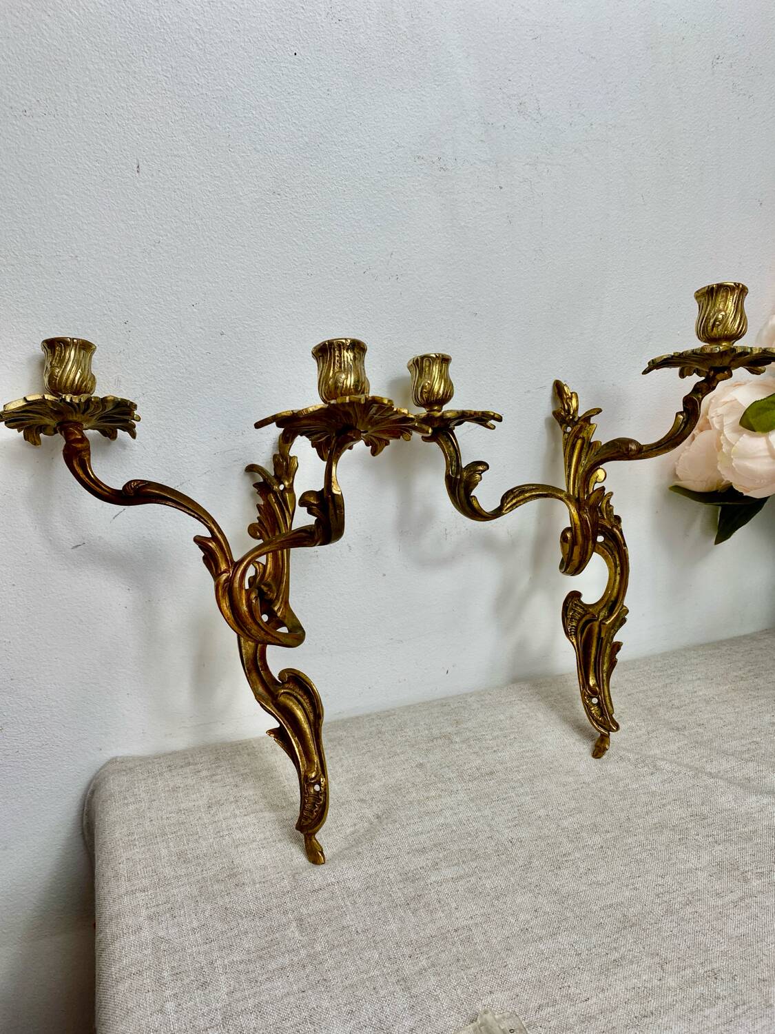 Two Louis XV style bronze wall candlesticks
