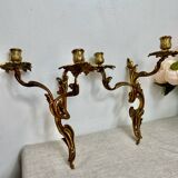 Two Louis XV style bronze wall candlesticks