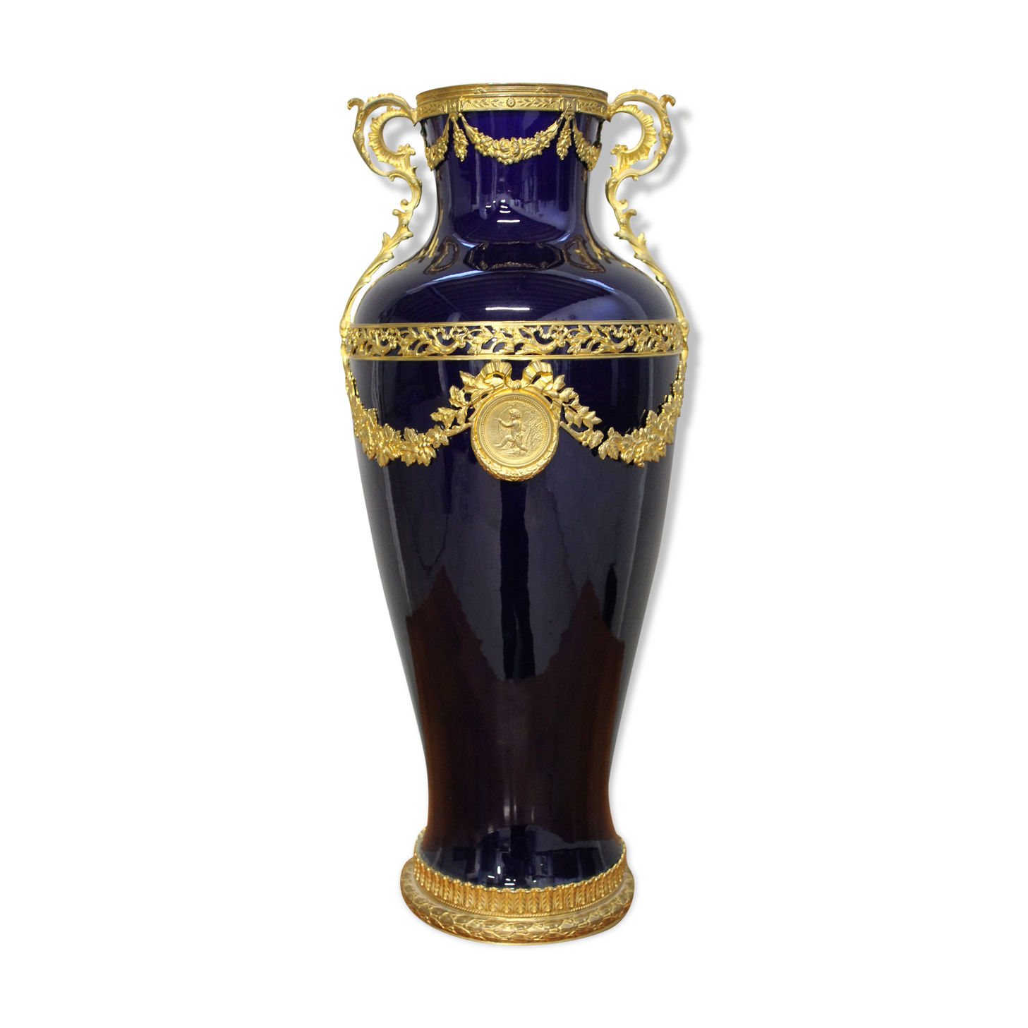 Vase signed Legastelois in blue ceramic of Sèvres and gilded bronze