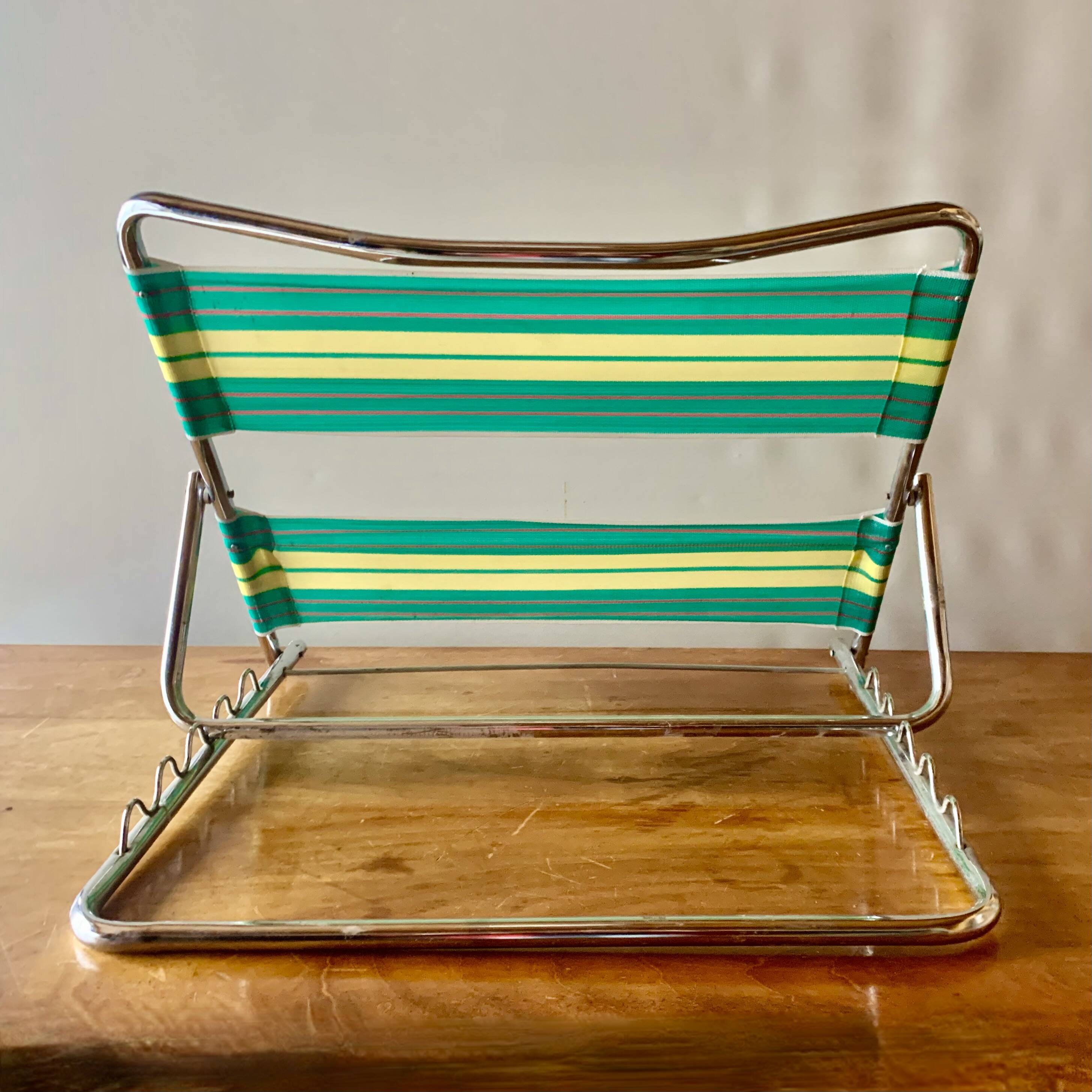 Vintage folding beach chair in chrome metal and woven plastic