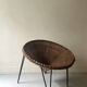 Italian sunflowers armchair in rattan and black metal, 1950s design.