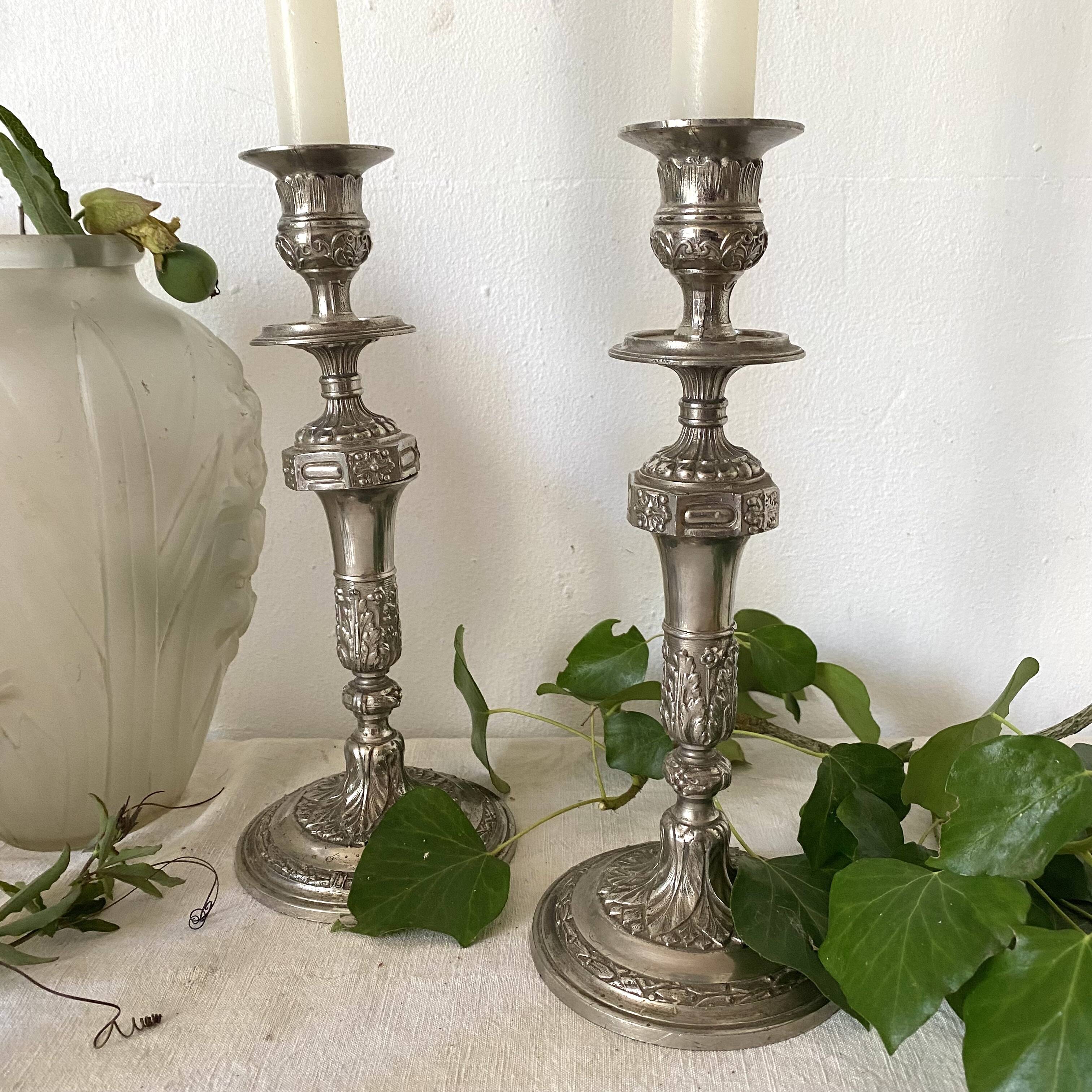 Pair of old silver-plated candlesticks
