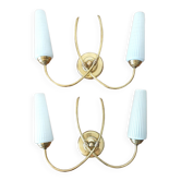 Pair of 1960 wall lamps in gilded brass and glass.
